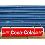 A Coca-Cola plastic illuminated lightbox with hanging chains, 39 1/2" wide x 8 1/2" high x 4" deep.