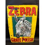 A Zebra Grate Polish pictorial enamel sign depicting a zebra with red eyes, some older retouching,