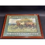 A framed and glazed Player's 'Country Life' Tobacco & Cigarettes pictorial showcard 'Hay Harvest