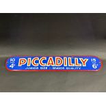 A small enamel sign advertising Piccadilly Junior Size cigarettes, excellent gloss, some minor