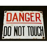 A small enamel warning sign, 'Danger Do Not Touch', 8 x 6".