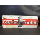 An aluminium sign advertising Courier Radial tyres, 30 x 11".