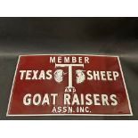 An unusual embossed tin advertising sign 'Member of Texas Sheep and Goat Raisers Ass'n. Inc. dated