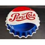 A Pepsi-Cola enamel sign in the shape of a crimped bottle lid, made in The Union of South Africa,