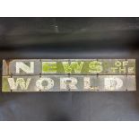 A two piece enamel sign advertising News of the World, 84 x 5" (combined).