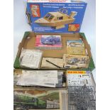 A quantity of boxed model kits including Airfix, military, classic car and train related.