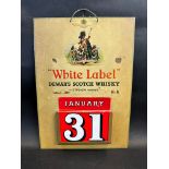 A Dewar's Scotch Whisky 'White Label' calendar showcard, dates unchecked, 11 x 15 3/4".