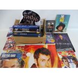 A quantity of Doctor Who annuals, books, videos etc.