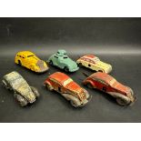 Six early tinplate clockwork model cars, most probably pre-war/just post-war.