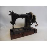 A Wheeler & Wilson sewing machine, model no. 9-H-4, circa 1904, serial no. 2779432.