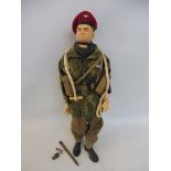 A D.I.D. British Army Paratrooper uniformed figure together with a US Infantry figure and a US