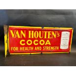 A pair of Dutch pictorial enamel signs with hanging flanges, advertising Van Houten's Cocoa, mounted