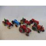 Six Corgi and Dinky die-cast tractor models including Massey Harris, Massey Ferguson, Fordson etc.