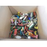 A box of mixed die-cast models.