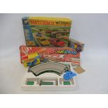 A boxed Matchbox Motorway Extension set - E-2 plus three further boxed Matchbox toys.