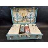 A cased Sirram picnic set.