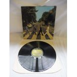 Beatles - Abbey Road, cover and vinyl VG+.