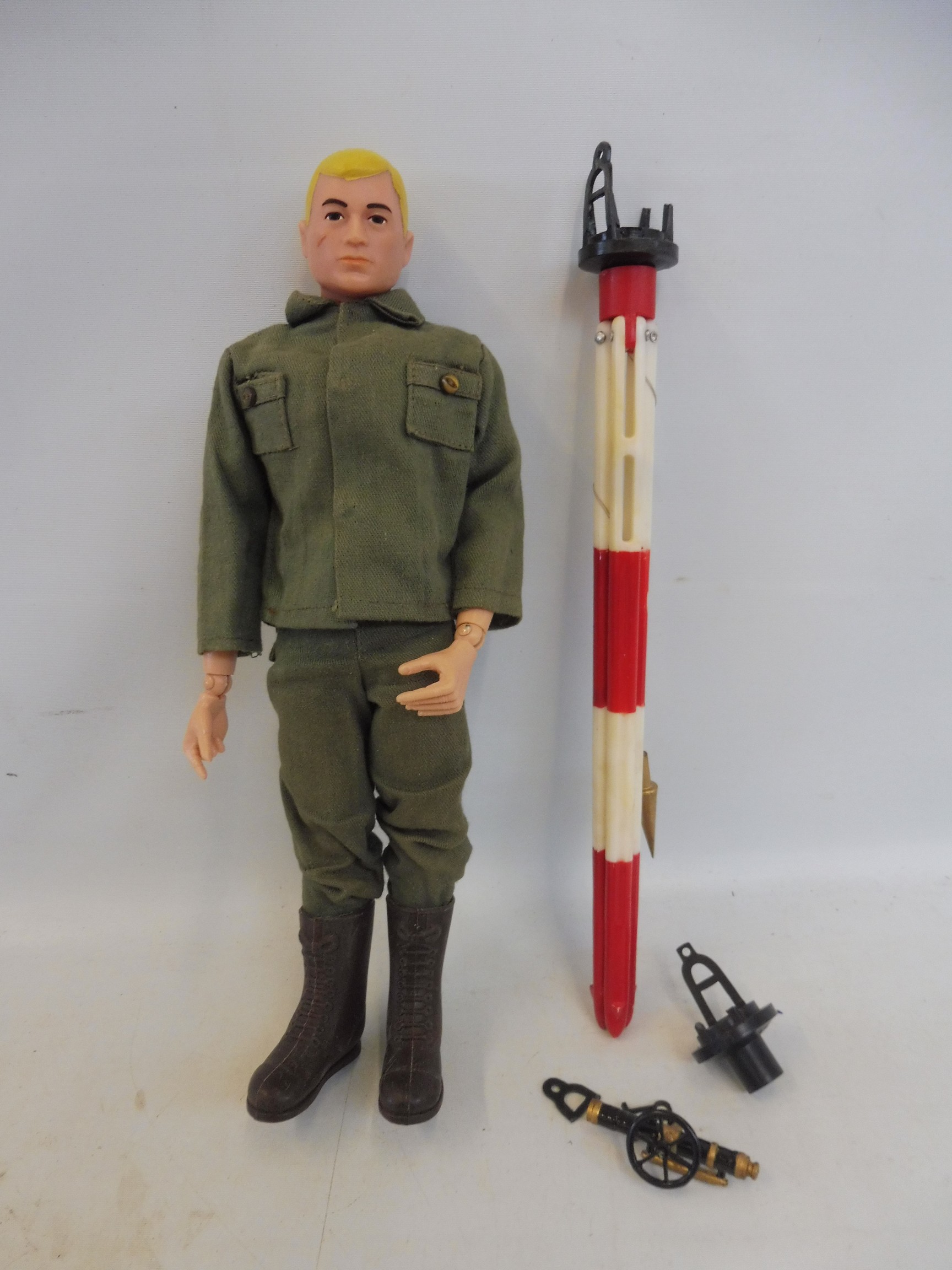 An Action Man Combat Construction selection on a 1960s blonde painted head figure complete with