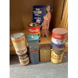 A die-cut 3D showcard advertising Saxin sweeteners plus a selection of tins mostly relating to