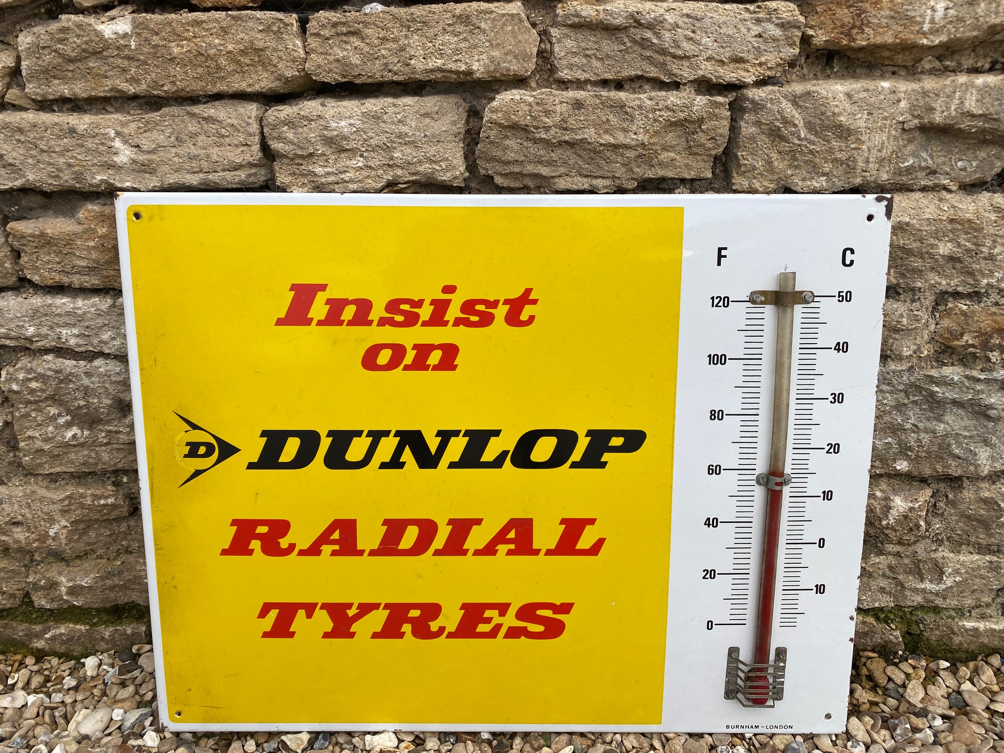 A Dunlop Radial Tyres enamel thermometer sign by Burnham, 26 x 20".