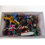 A box of predominantly plastic action figures, Batman etc.