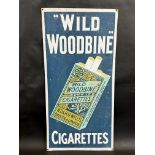 A Wills 'Wild Woodbine' pictorial packet tin advertising sign, 14 3/4 x 29 1/4".