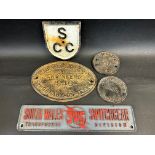 A selection of cast iron and other plaques including South Wales Switchgear, S.C.C., Head