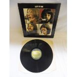 Beatles - Let it Be, cover and vinyl in at least VG+ condition.