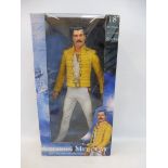 A Neca 18" Freddie Mercury figure with sound, motion activated, boxed.