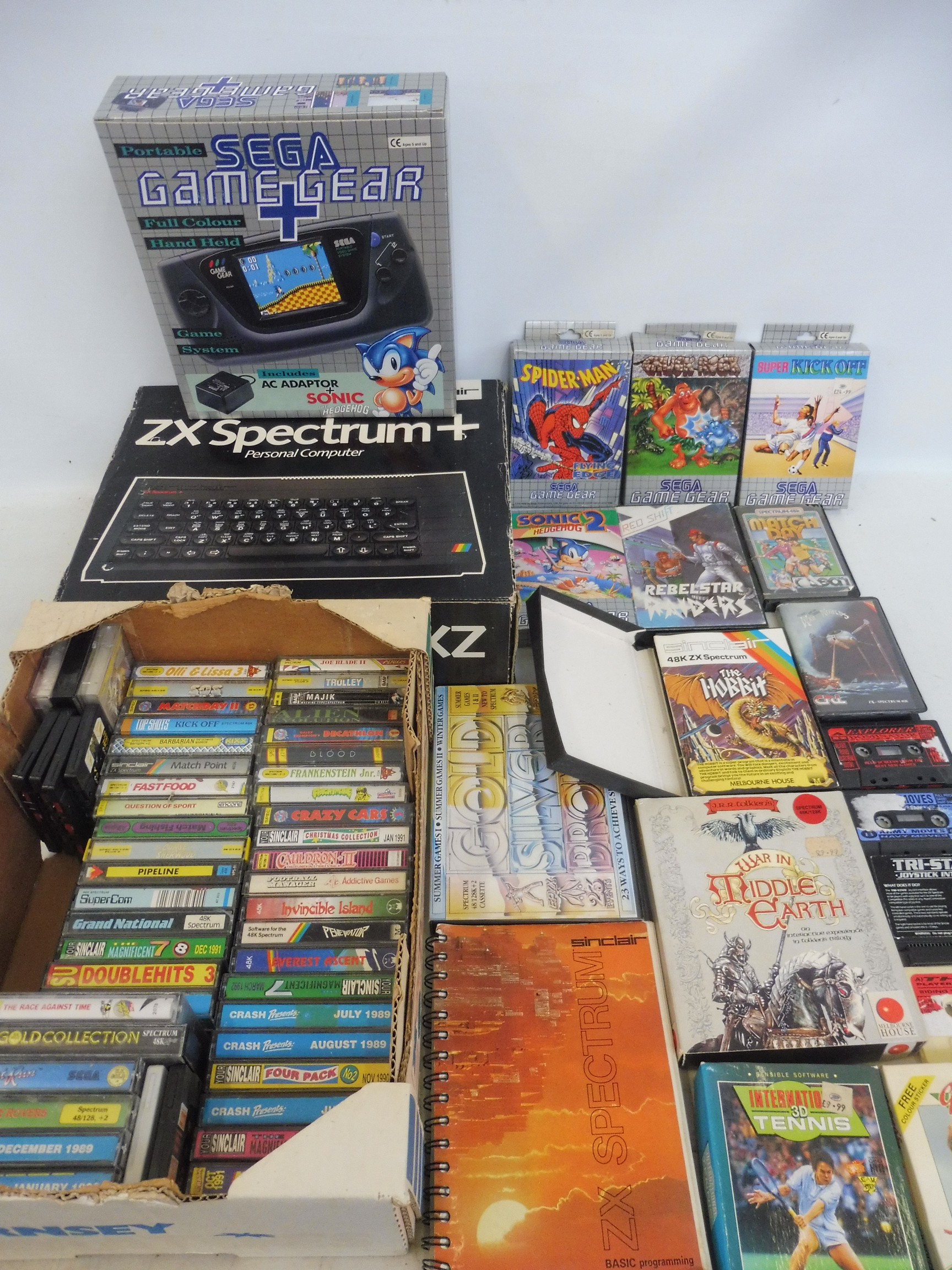 A Sinclair ZX Spectrum personal computer, boxed, with a large selection of original Spectrum