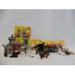 Five Lego knight themed sets, no. 6073 Knights Castle, no. 6041 Armour Shop, no. 6030 Catapult,