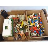 A large collection of Playmobil figures, vehicles and accessories.