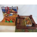 A period Wild West fort, a box of plastic Native American figures and a boxed Jean Grand Canyon, box