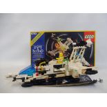 A boxed Lego XT-Starship Light & Sound System, not checked.