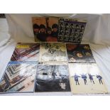 A selection of eight original Beatles on yellow and black Parlaphone comprising Beatles For Sale,