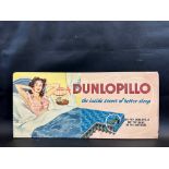 A pictorial celluloid showcard advertising Dunlopillo mattresses, 24 x 11".