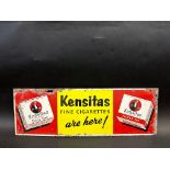 A rectangular tin sign advertising Kensitas Fine Cigarettes, 20 x 7".