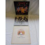 Three Queen LPs The Works, Night at the Opera and A Kind of Magic, all in at VG condition.