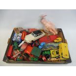 A tray of circa 1970s die-cast and plastic toys, some boxed.