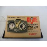 An original G.I. Joe combat watch with compass and sighting lenses, made by Gilbert Toys, in