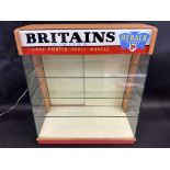 A rare circa late 1950s Britains Herald Series shop counter display cabinet with rear sliding doors,