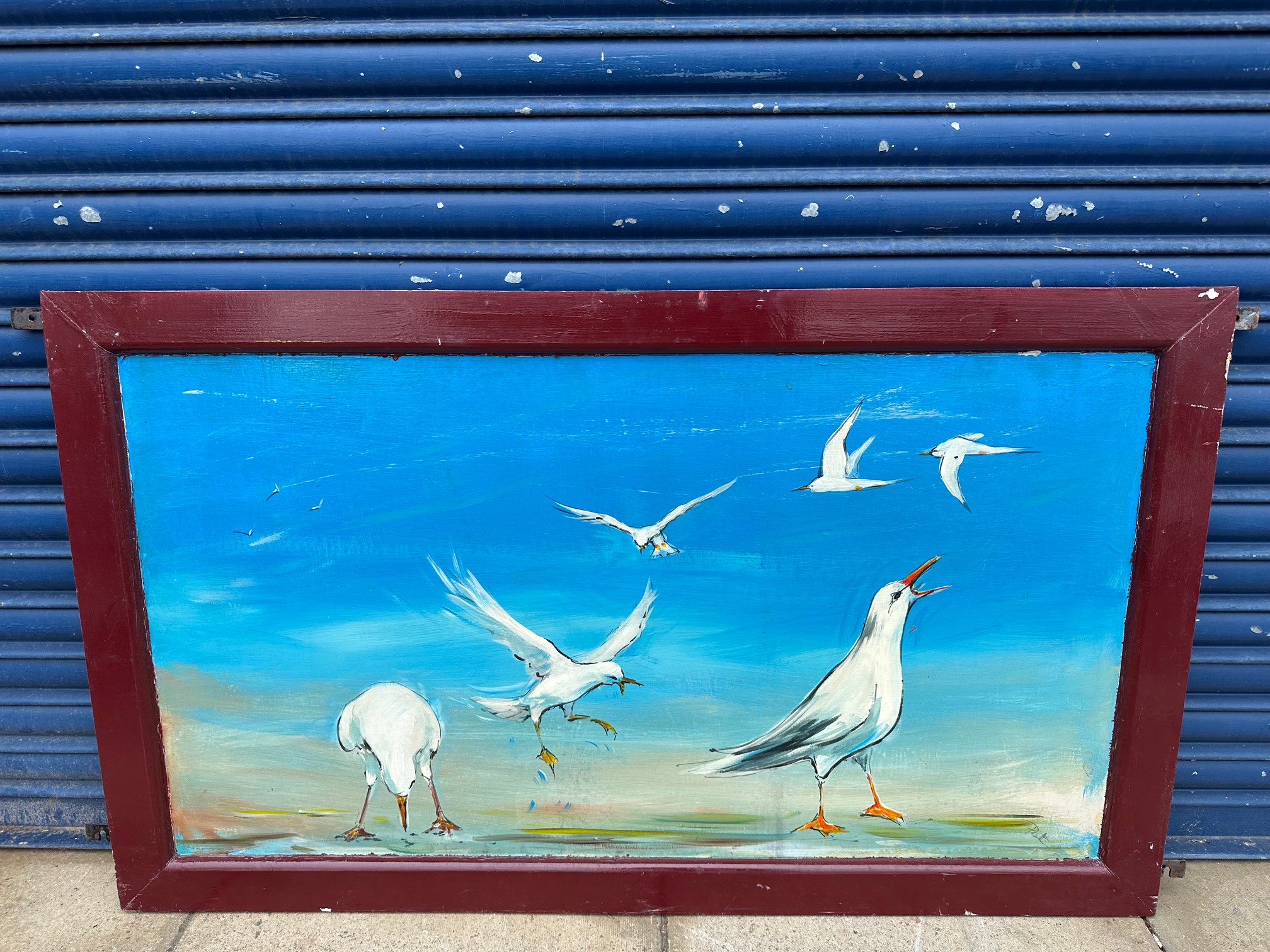 An unusual fairground panel from a shooting gallery featuring seagulls and ospreys.