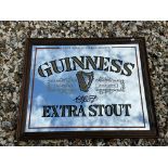 A Guinness Extra Stout reproduction advertising mirror, 23 1/4 x 19 1/4".