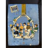 A Wills Capstan Navy Cut Cigarettes pictorial tin advertising sign depicting an oversized stirrup