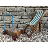 A good quality doll's deckchair (22 1/2" high) and a Tri-ang baby walker.