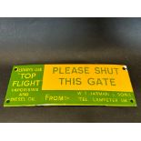 A small enamel 'Please Shut This Gate' sign, advertising Top Flight Vaporising and Diesel Oil,