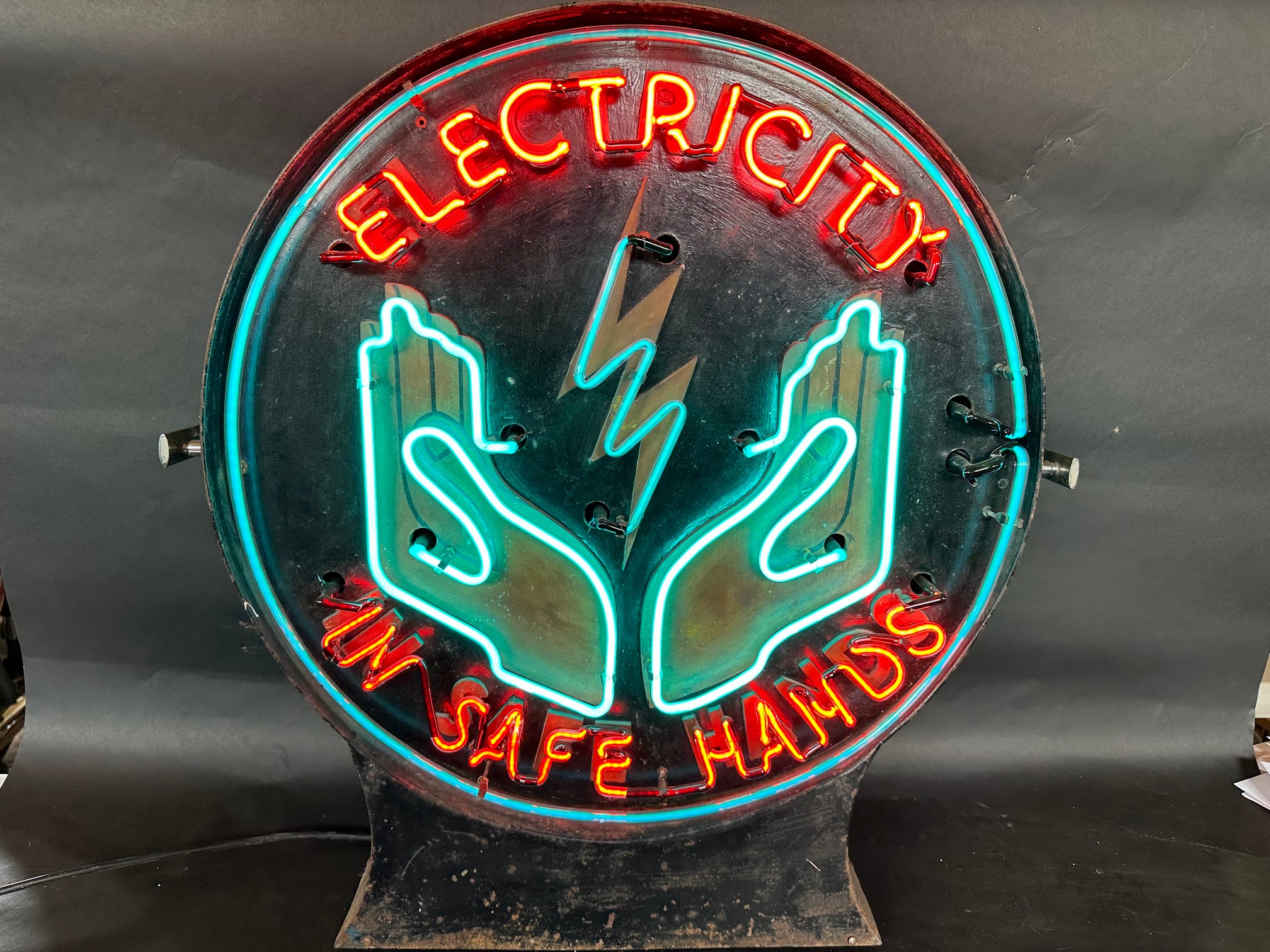 A fabulous illuminated neon lightbox, in excellent working condition, bearing the words 'Electricity