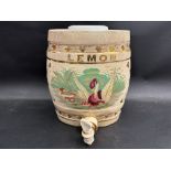 An Edwardian oval spirit barrel 'Lemon' with porcelain tap and associated lid, 10 1/2" h.