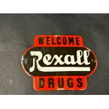 A small enamel door plaque advertising Rexall Drugs (USA Pharmacy), 6 x 4 1/2".