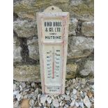 A tin fronted thermometer with advertising for Hind Bros, & Co. Ltd, Nutrine, 3 3/4 x 13".